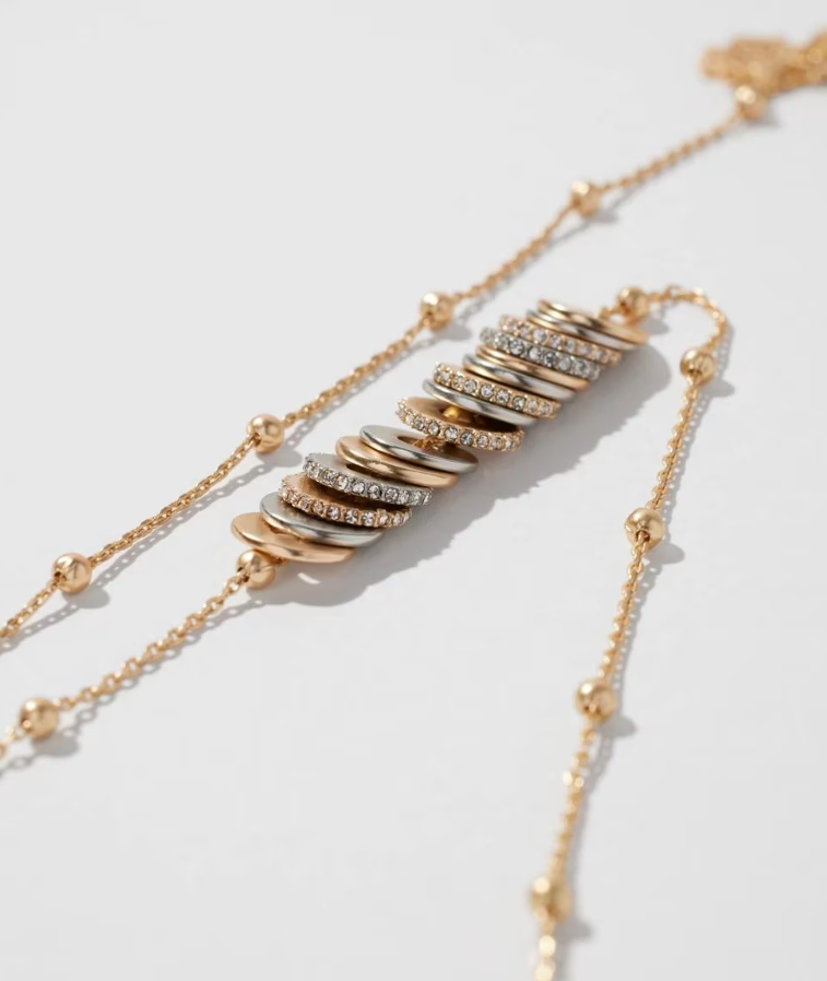 WHITE HOUSE BLACK MARKET METAL RINGS PENDANT NECKLACE