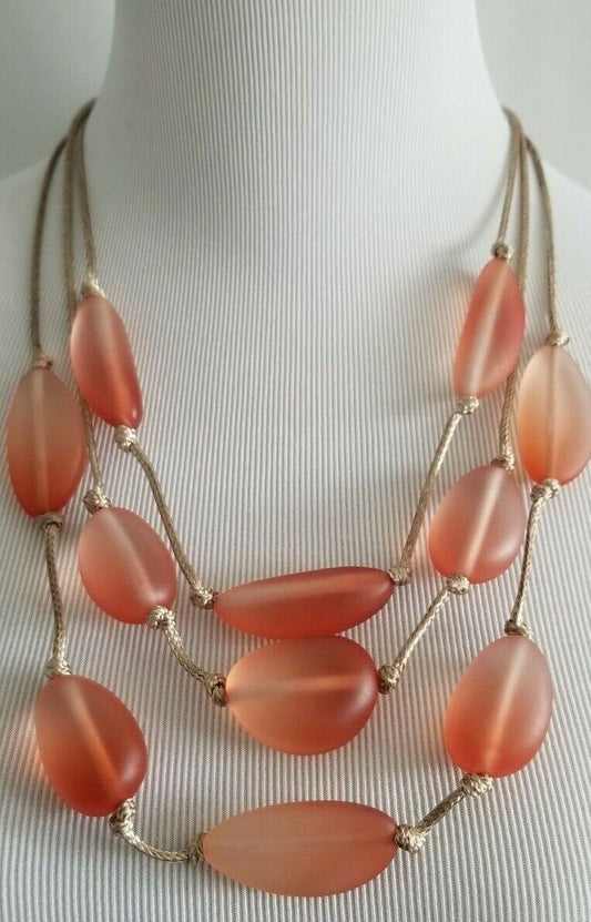 CHICO'S CORAL-HUED ILLUSION NECKLACE